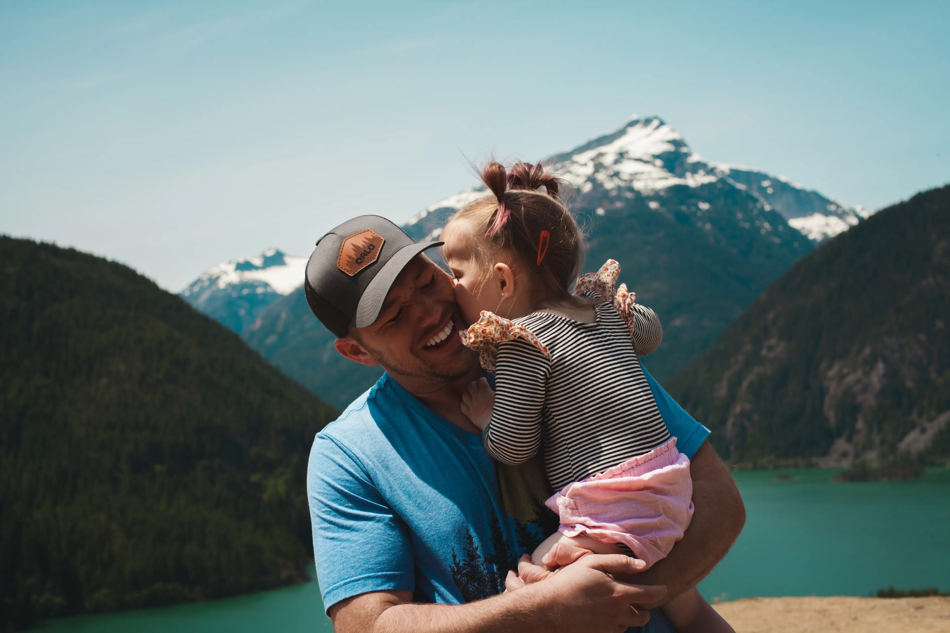 Man and child in the mountains